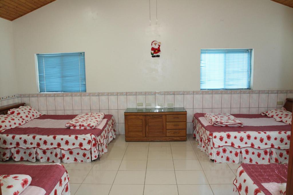 Postel nebo postele na pokoji v ubytování Fei Ying Homestay