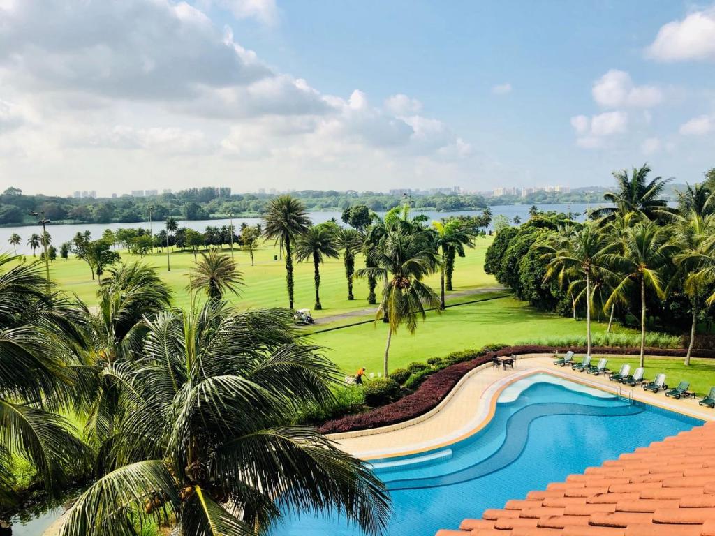 a view of the pool at the resort at Orchid Country Club in Singapore