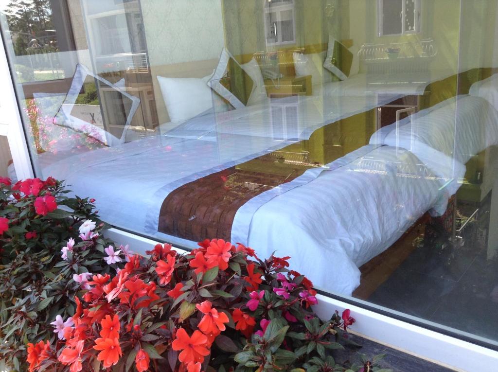 Postel nebo postele na pokoji v ubytování Mr Rot's Secret Hotel