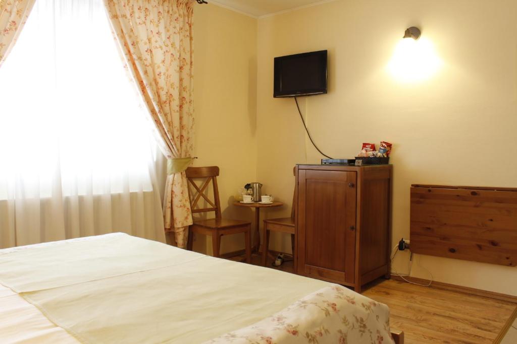 TV a/nebo společenská místnost v ubytování Vila Toparceanu - Therme & Airport Otopeni