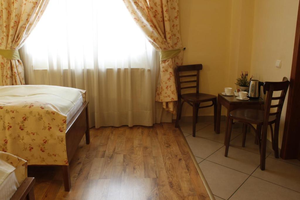 Postel nebo postele na pokoji v ubytování Vila Toparceanu - Therme & Airport Otopeni