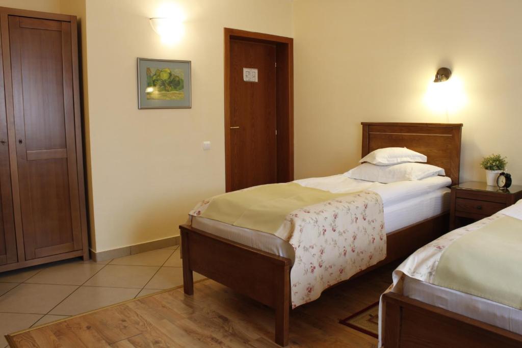 Postel nebo postele na pokoji v ubytování Vila Toparceanu - Therme & Airport Otopeni