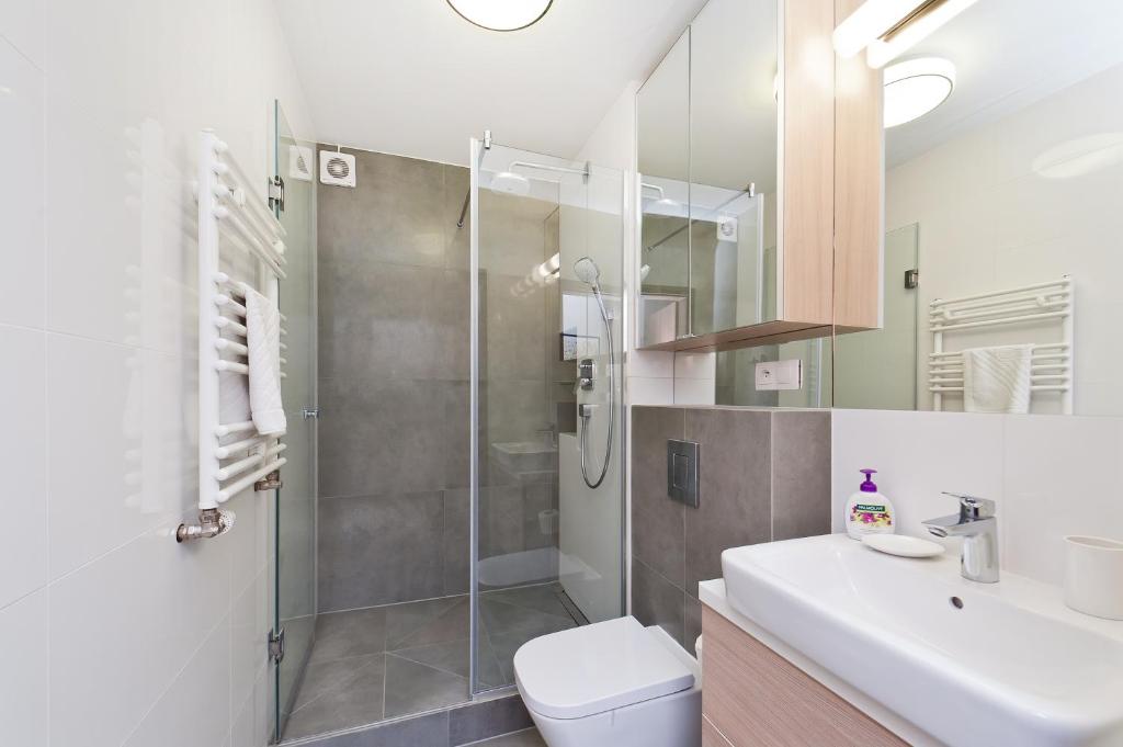 Kúpeľňa v ubytovaní Olimp Apartments