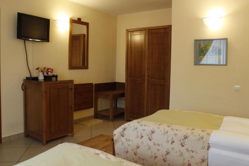 Postel nebo postele na pokoji v ubytování Vila Toparceanu - Therme & Airport Otopeni
