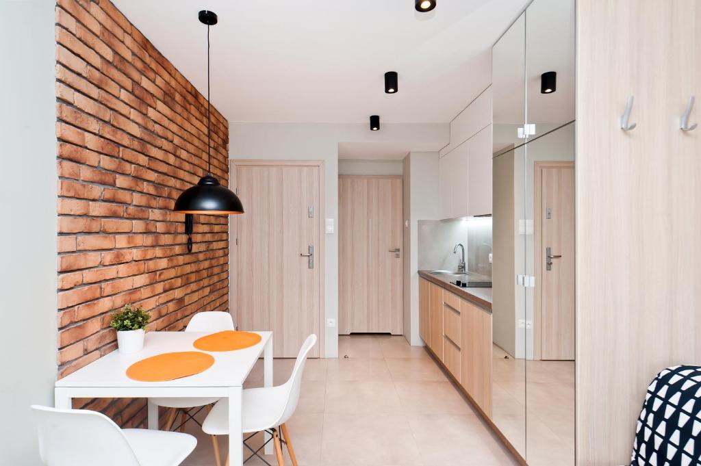 Kuchyňa alebo kuchynka v ubytovaní Olimp Apartments