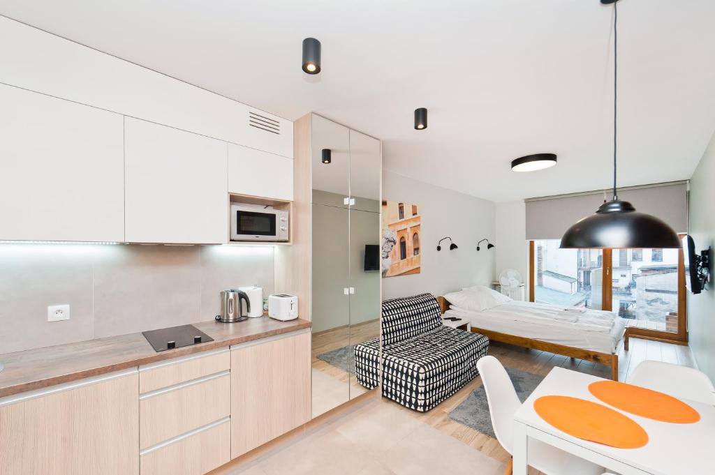 Kuchyňa alebo kuchynka v ubytovaní Olimp Apartments