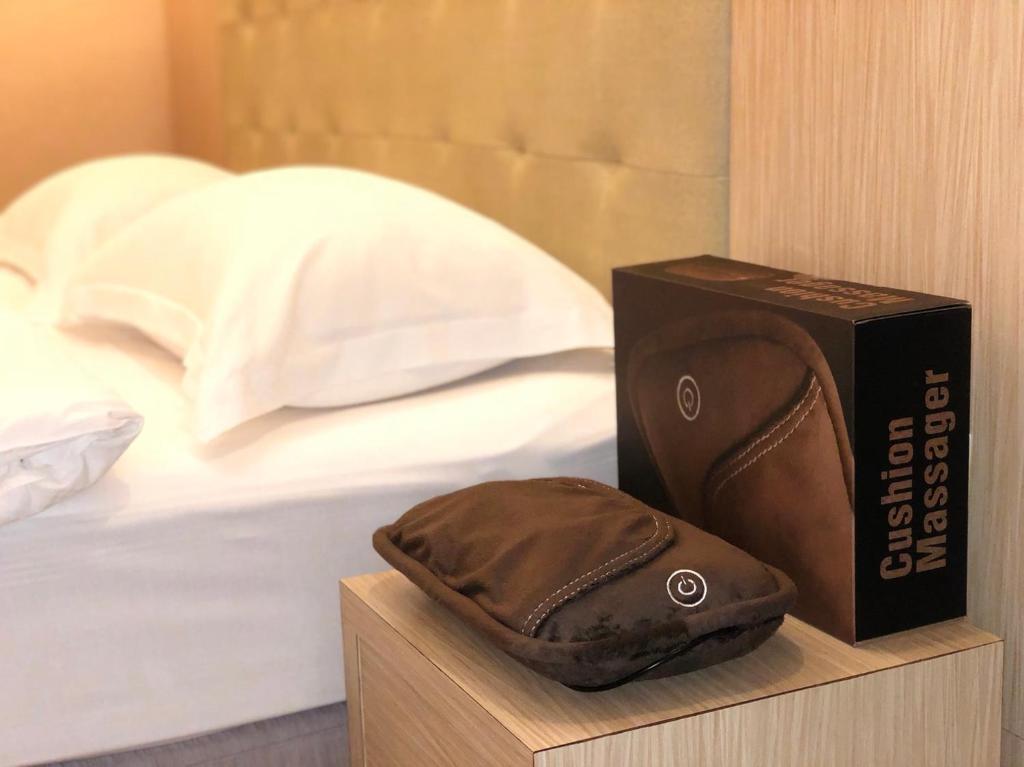 Letto o letti in una camera di The Riverside Hotel Hengchun