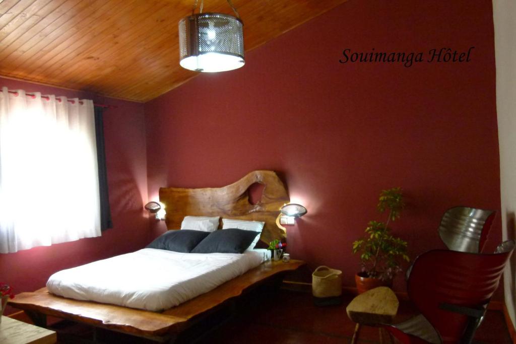 Un ou plusieurs lits dans un hébergement de l'établissement SOUIMANGA-HOTEL