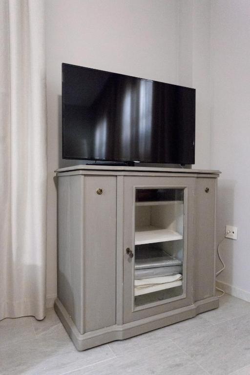 Televízia a/alebo spoločenská miestnosť v ubytovaní Casa Viana