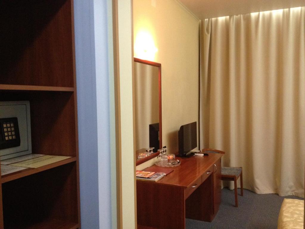 TV a/nebo společenská místnost v ubytování Uliss