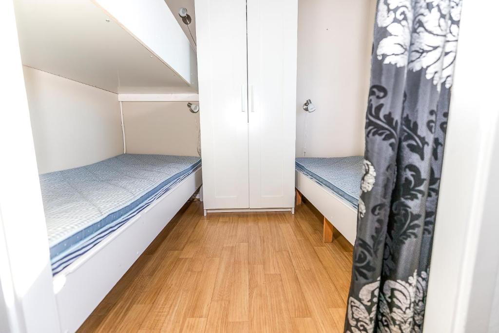 Postel nebo postele na pokoji v ubytování Olofsbo Camping