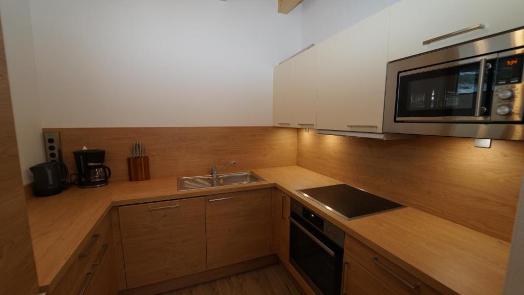 Kuchyň nebo kuchyňský kout v ubytování Apartment Hanna