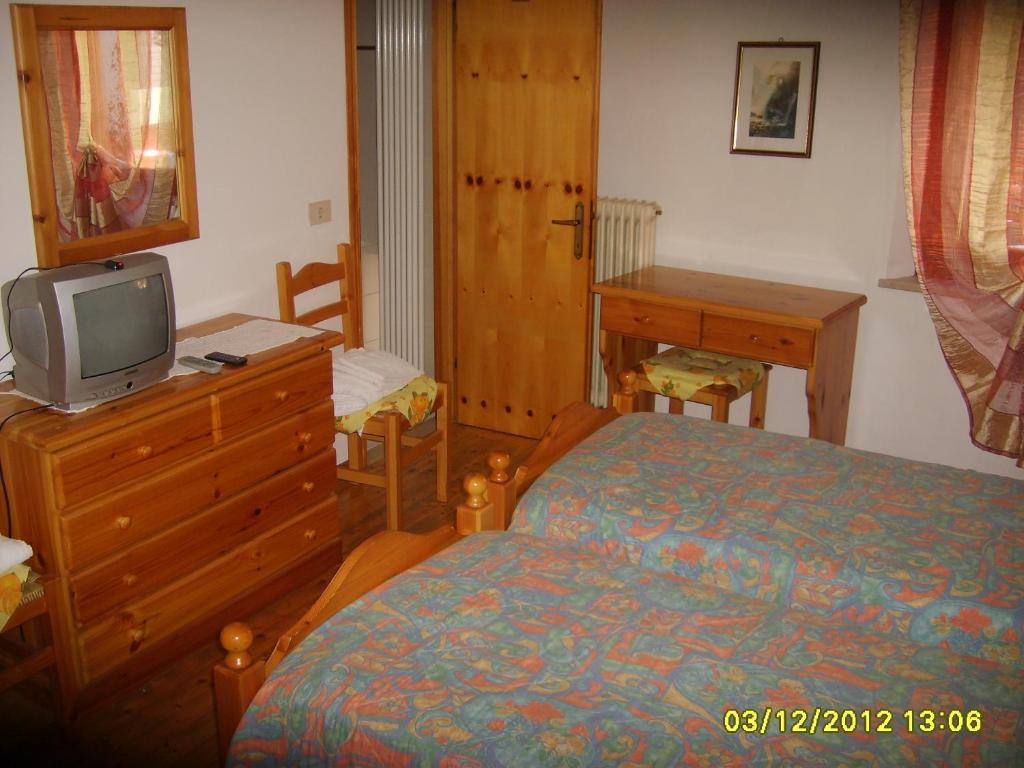 TV a/nebo společenská místnost v ubytování Antico Albergo Sant'Antonio