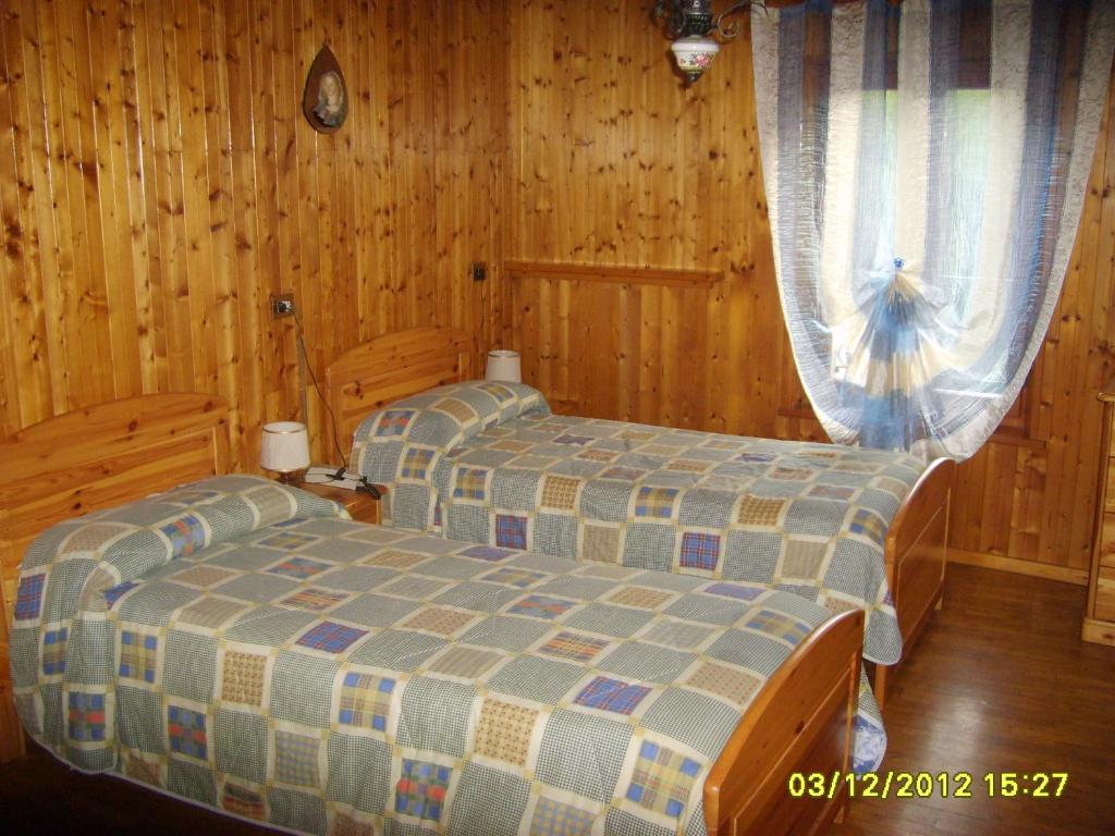 Postel nebo postele na pokoji v ubytování Antico Albergo Sant'Antonio