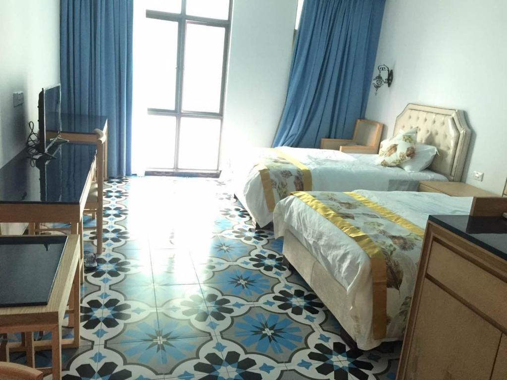 Postel nebo postele na pokoji v ubytování Hotel Hilal