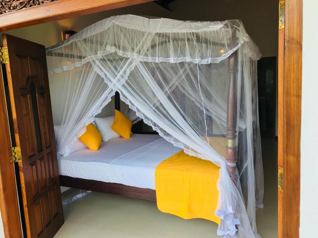 Postel nebo postele na pokoji v ubytování Neli guests house