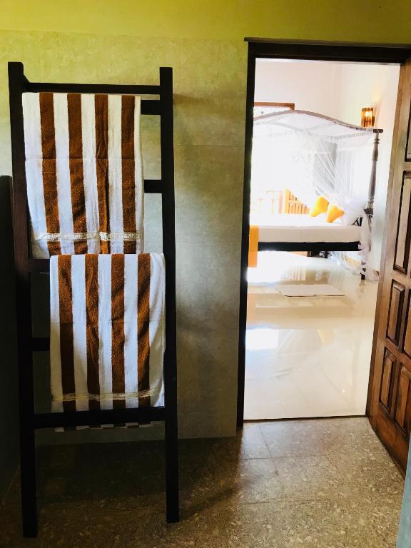 Postel nebo postele na pokoji v ubytování Neli guests house