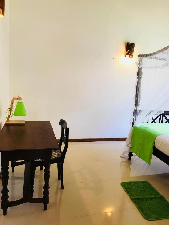 Postel nebo postele na pokoji v ubytování Neli guests house