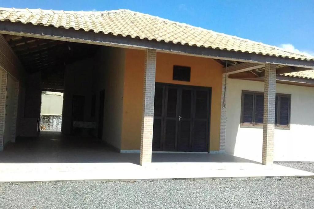 a rendering of a house with a garage at Meu pequeno paraíso in Itapoa