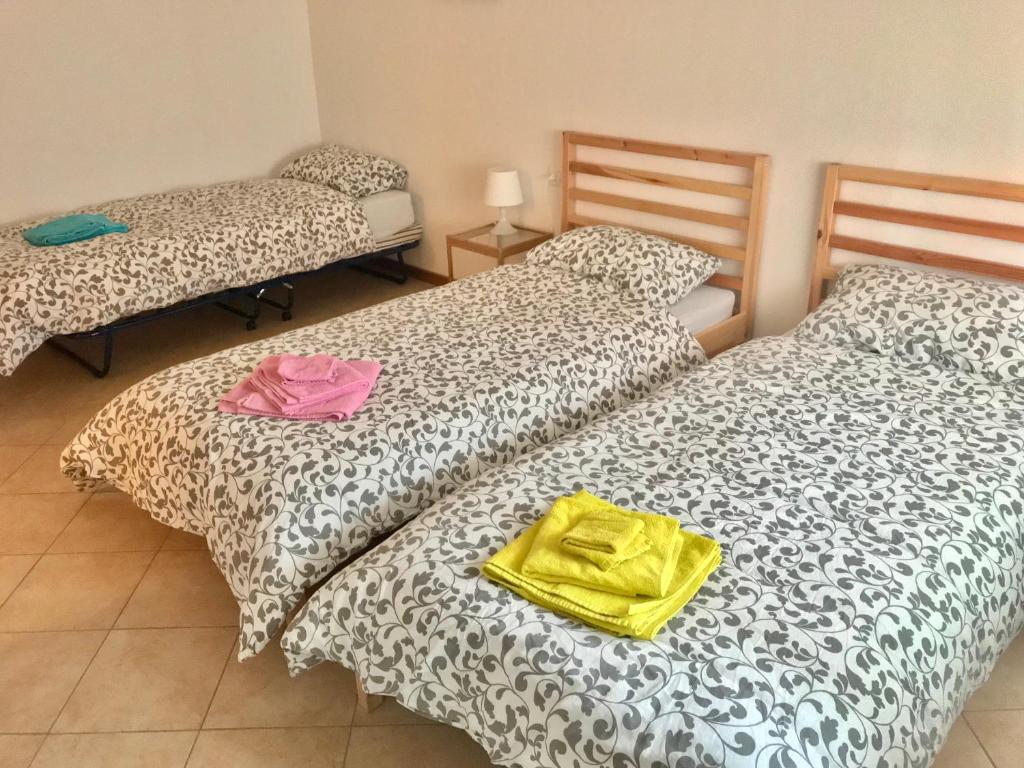 Posteľ alebo postele v izbe v ubytovaní Aduepassidallafiera