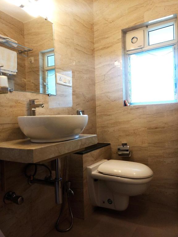 Koupelna v ubytování Hotel Cozy Inn