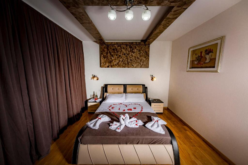 Postel nebo postele na pokoji v ubytování Hotel Trieste