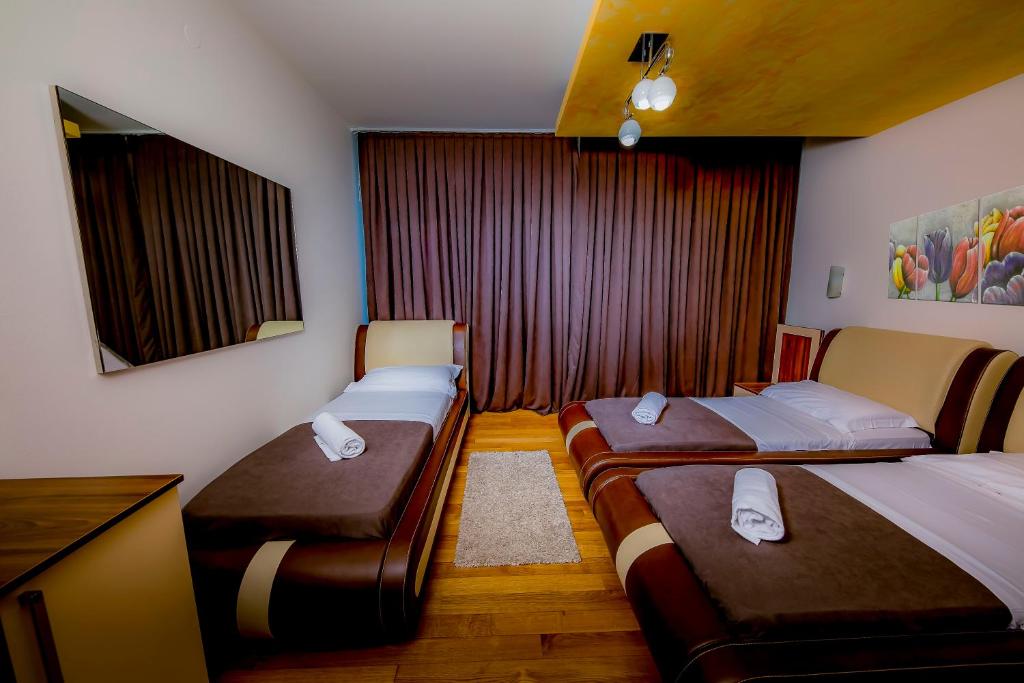 Postel nebo postele na pokoji v ubytování Hotel Trieste