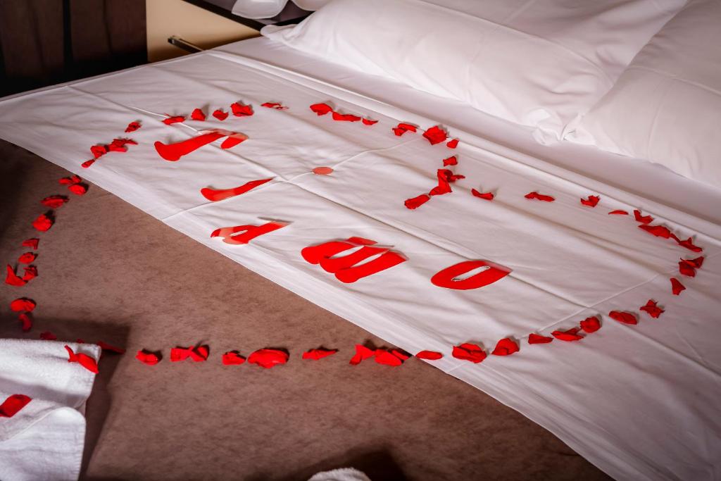 Postel nebo postele na pokoji v ubytování Hotel Trieste