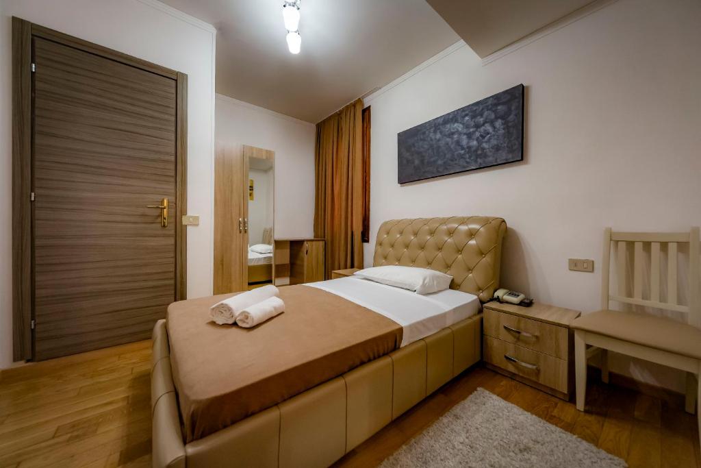 Postel nebo postele na pokoji v ubytování Hotel Trieste