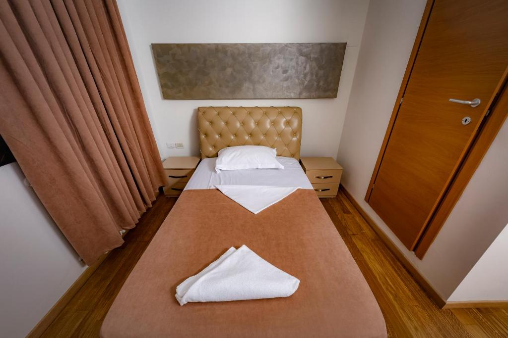 Postel nebo postele na pokoji v ubytování Hotel Trieste
