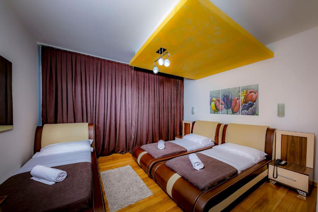 Postel nebo postele na pokoji v ubytování Hotel Trieste