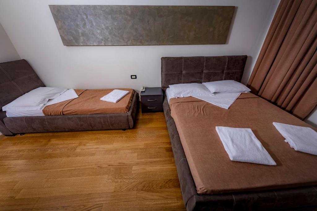 Postel nebo postele na pokoji v ubytování Hotel Trieste