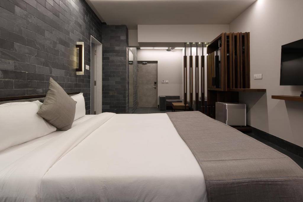Postel nebo postele na pokoji v ubytování Hotel Carrefour