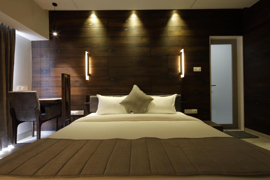 Postel nebo postele na pokoji v ubytování Hotel Carrefour