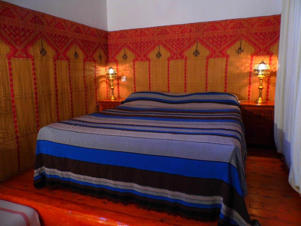 Voodi või voodid majutusasutuse Riad A La Belle Etoile toas