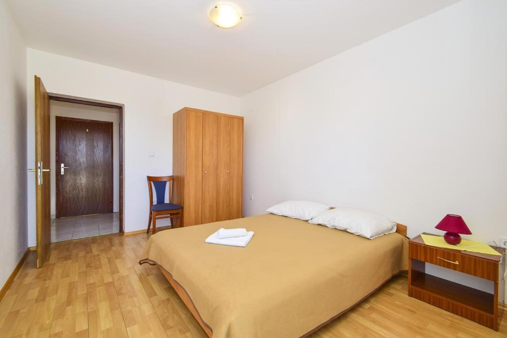 Postel nebo postele na pokoji v ubytování Guesthouse Dupin