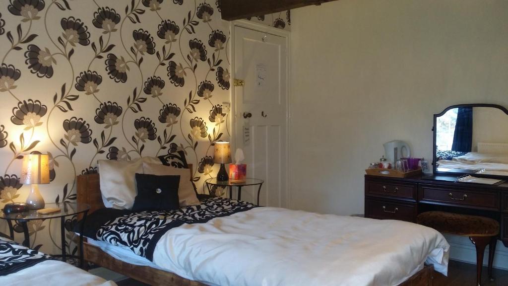 Postel nebo postele na pokoji v ubytování Kingsmede Bed & Breakfast