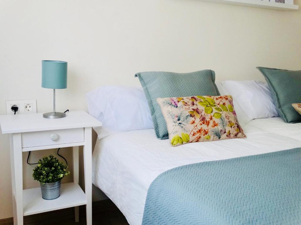 Posteľ alebo postele v izbe v ubytovaní Apartamento El Barranco