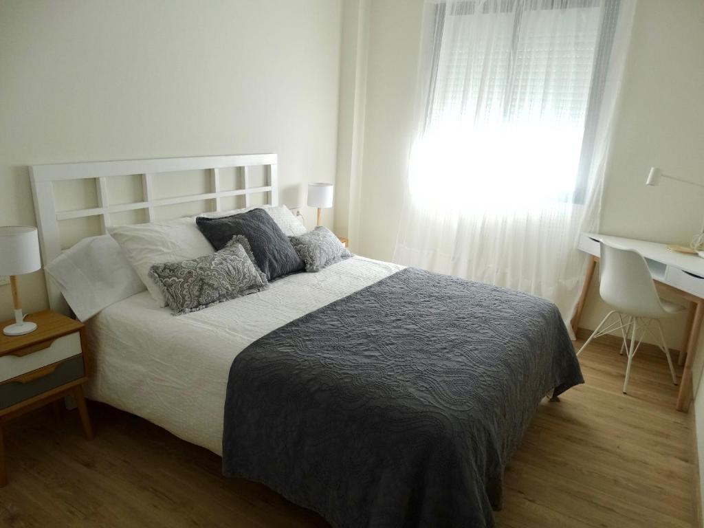 Posteľ alebo postele v izbe v ubytovaní Apartamento El Barranco