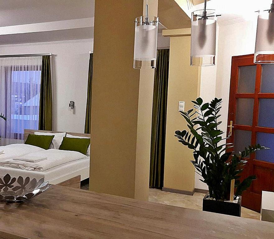 Posteľ alebo postele v izbe v ubytovaní RP FitLife Stúdió és Vendégház
