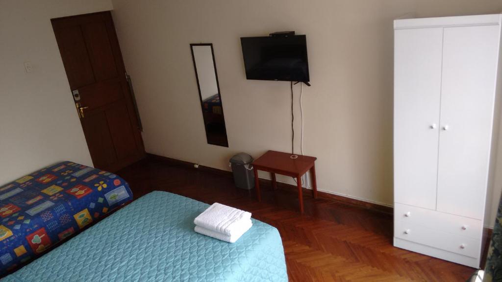 Postel nebo postele na pokoji v ubytování Cozy and Comfortable Home in MIRAFLORES