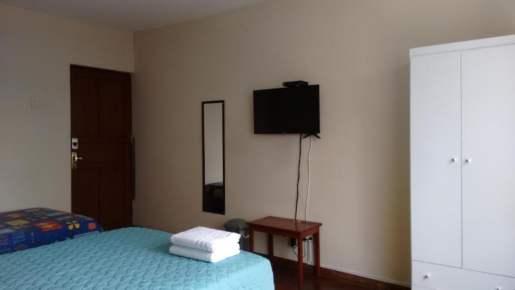 Postel nebo postele na pokoji v ubytování Cozy and Comfortable Home in MIRAFLORES