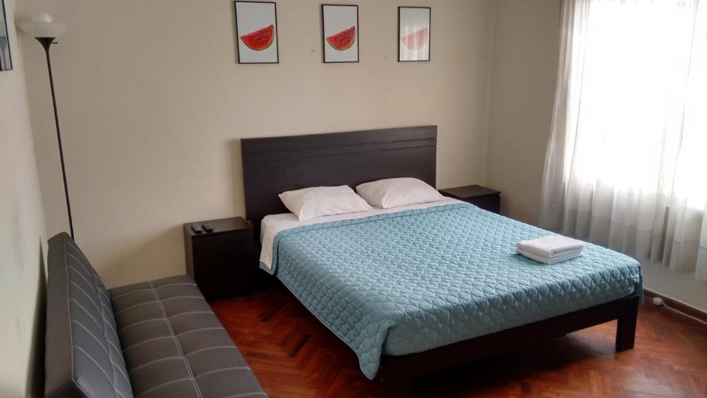 Postel nebo postele na pokoji v ubytování Cozy and Comfortable Home in MIRAFLORES