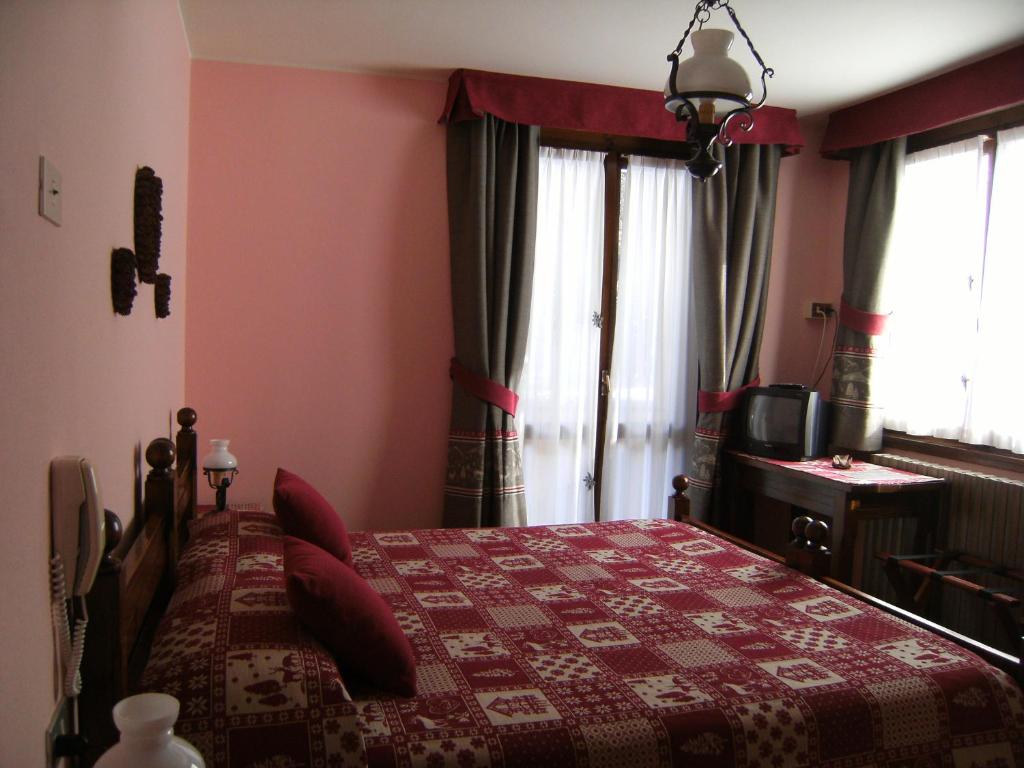 Postel nebo postele na pokoji v ubytování Albergo Thurwieser