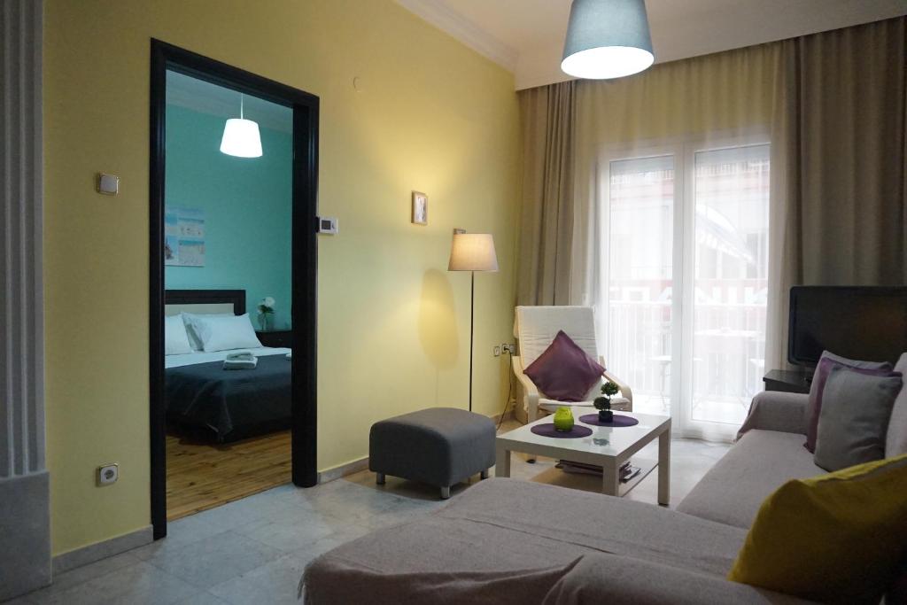 Posteľ alebo postele v izbe v ubytovaní Navarino Square Apartment