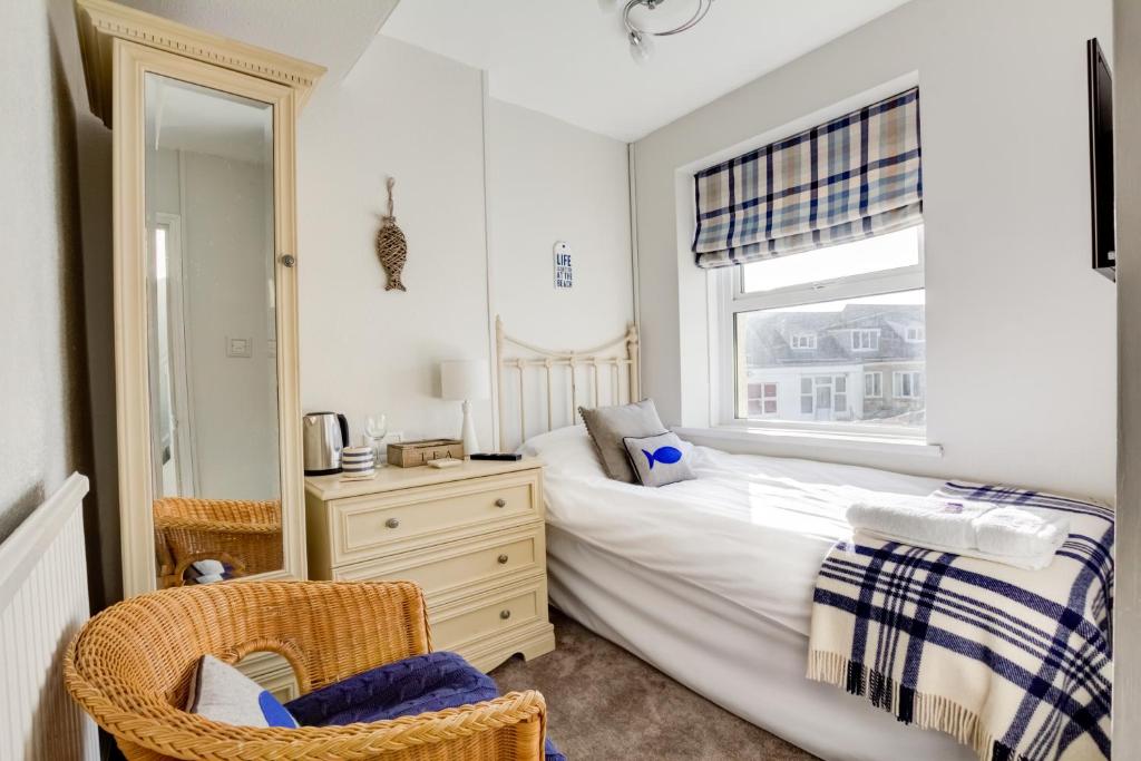 Postel nebo postele na pokoji v ubytování Sunrise Guest House