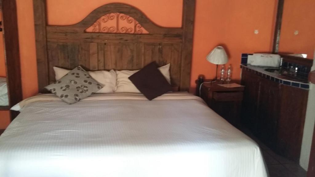 Katil atau katil-katil dalam bilik di Hotel Revi Inn