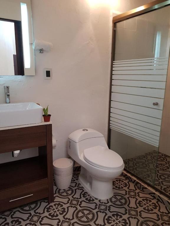 Koupelna v ubytování Hotel Maculís