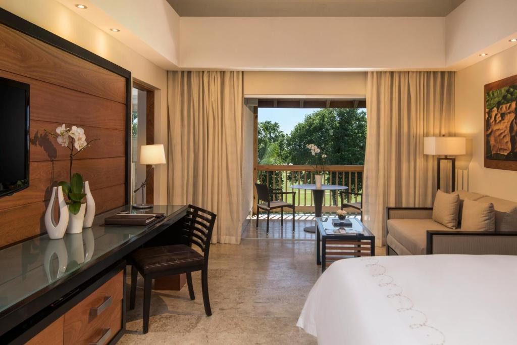Postel nebo postele na pokoji v ubytování Casa de Campo Resort & Villas