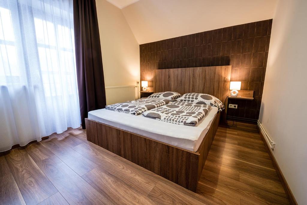 Postel nebo postele na pokoji v ubytování Shubu Zen Vendégház